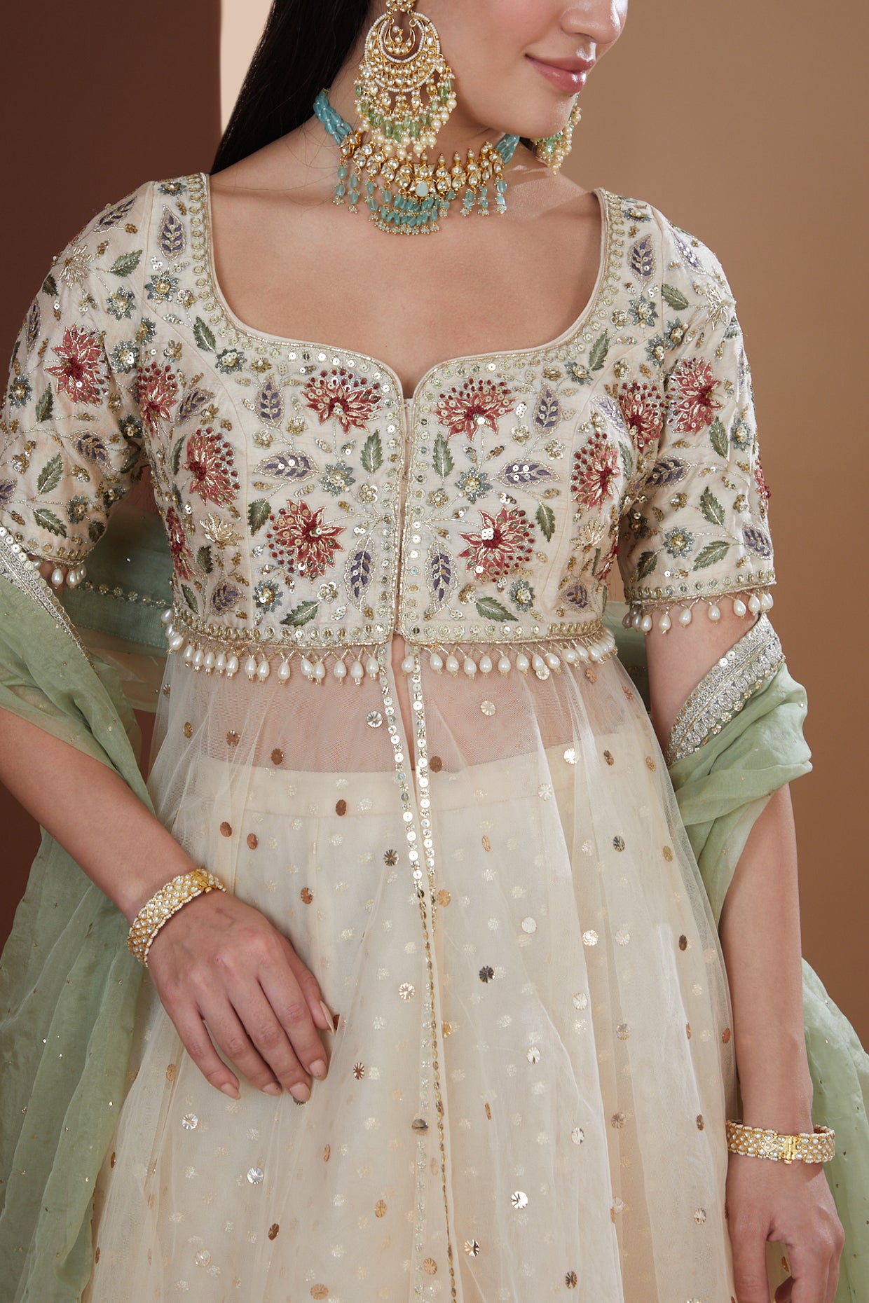 Ecru Silk Embroidered Peplum Lehenga Set